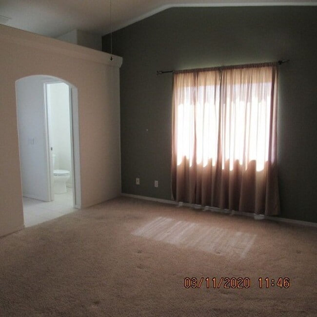 Building Photo - 3 bedroom 2 bath home with 3 car garage and RV parking