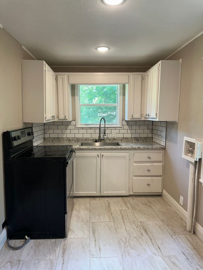 Building Photo - $1,200.00 MOVE-IN-SPECIAL