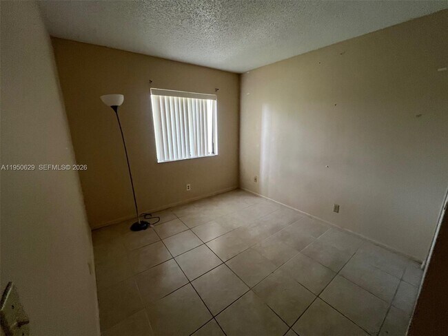 Building Photo - 11394 Royal Palm Blvd