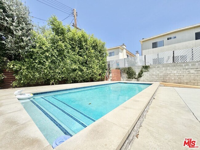 Building Photo - 5937 Ranchito Ave