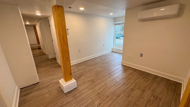 Building Photo - 7423-7429 Hampson - 7423 Basement Left