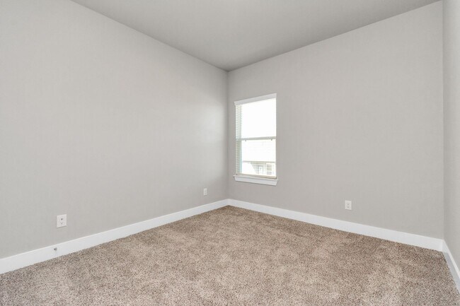 Building Photo - Welcome to the Holly — Spacious Comfort, Modern Style.