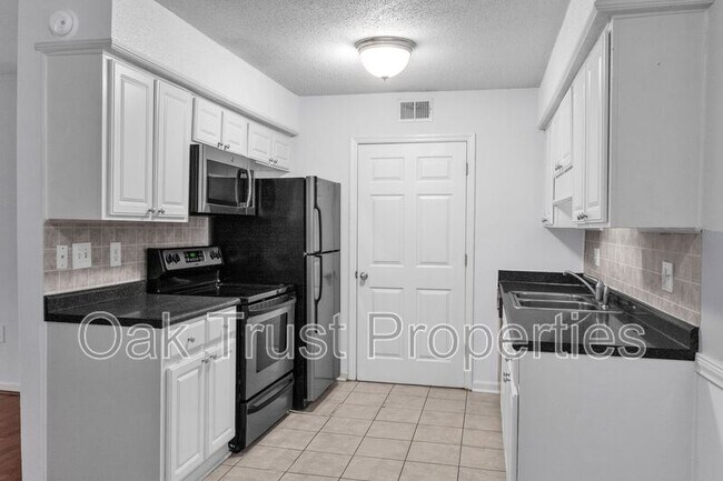 Building Photo - 1402 Camp Rd