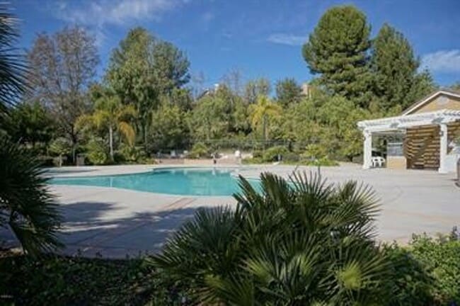 Building Photo - Located on a cul-de-sac, within the gated ...