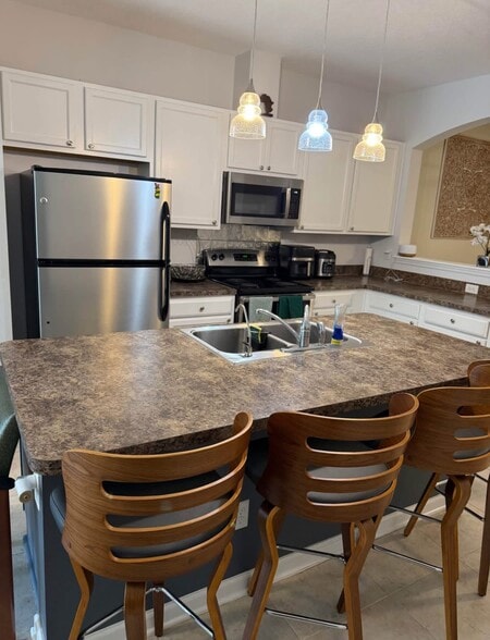 Building Photo - 4220 Plantation Oaks Blvd