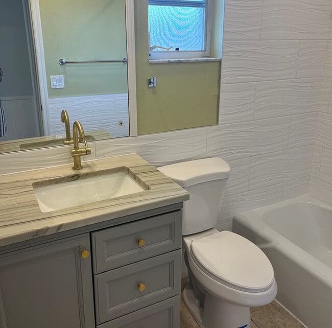 Building Photo - Lost in Paradise USA LLC