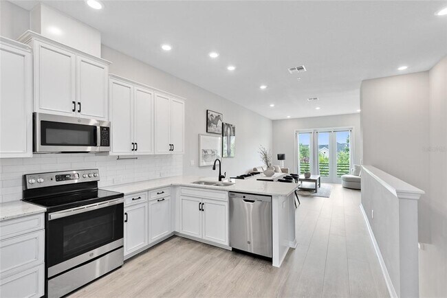 Building Photo - 8645 Tavistock Lakes Blvd