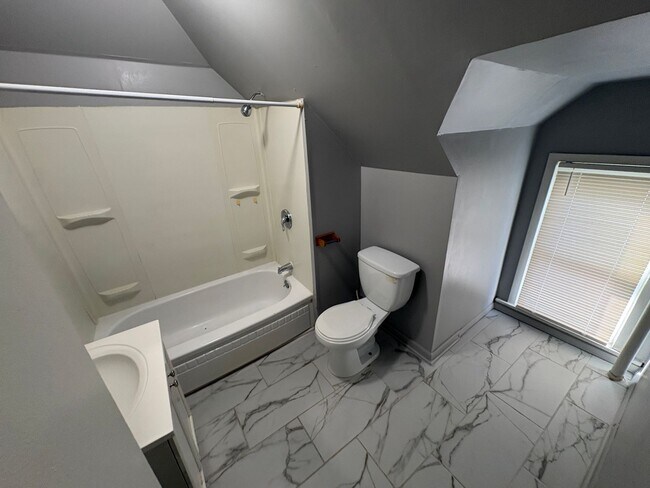 Building Photo - Lovely & Spacious 4-Bedroom Single-Family Home with Open Backyard