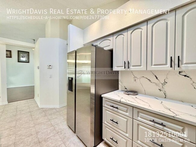 Building Photo - 10028 Oasis Palm Dr