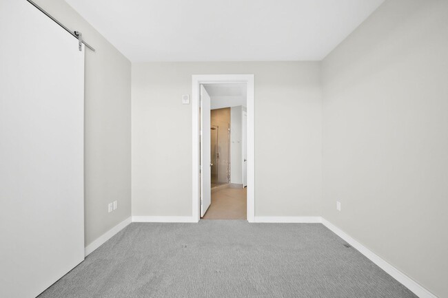 Building Photo - 6th Floor 1BD, 1.5BA Condo at the Lakehouse off Sloan's Lake