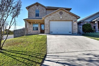 Building Photo - 4 Bedrooms!!!!! 2.5 bath and 2 attached ca...
