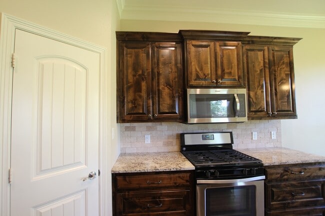 Building Photo - Beautiful 4 Bedroom Home Coming Soon in Bu...