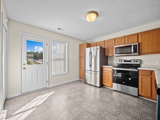 Building Photo - Welcome to Cornerstone Village!