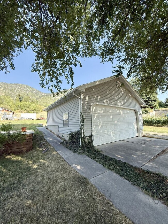 Building Photo - Timeless Charm, Modern Living — 4-Bed Gem ...