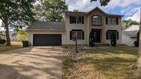 Building Photo - Welcome to your new home in the Heart of Plain Township.