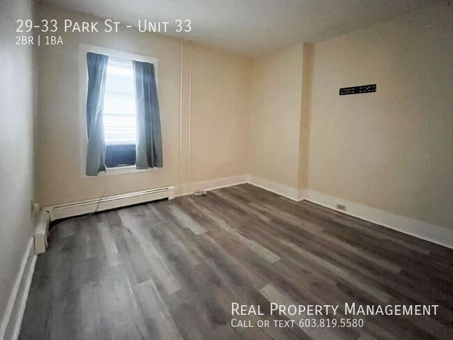 Building Photo - Pet-Friendly, Downtown 2-Bed with Heat and...