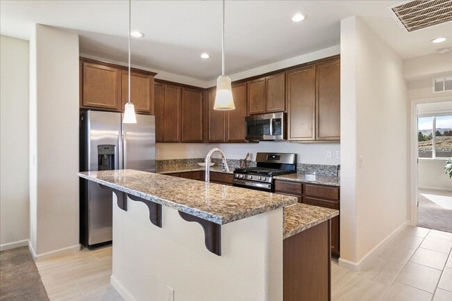 Building Photo - The Tahoe - Luxury 3 Bedroom, 2.5 Bath Townhome with Full 2 Car Garage