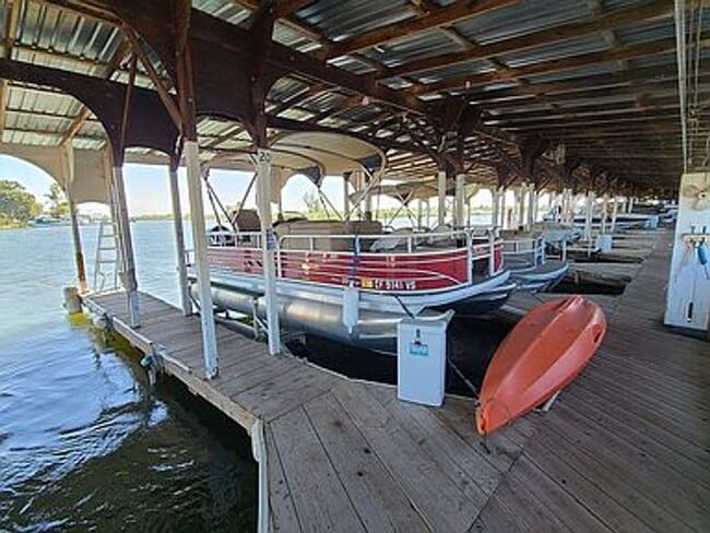 Building Photo - Fabulous Waterfront Condo with Private Boa...