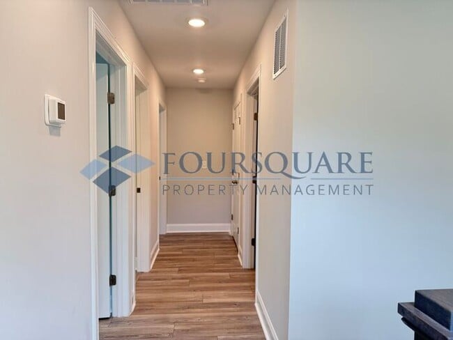 Building Photo - End-Unit Townhome with Fenced Yard, Washer/Dryer included & 2-Car Garage – Comfortable & Convenie...
