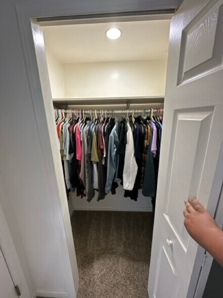 Primary bedroom closet - 14516 Birchwood Dr