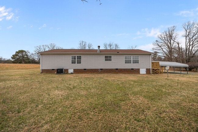 Building Photo - Charming 4-Bedroom Home on Spacious 2.64-Acre Lot in Graham, NC