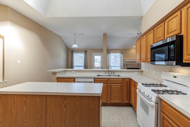 Lots of Cabinets and there is a pantry. - 416 Windy Hill Ln