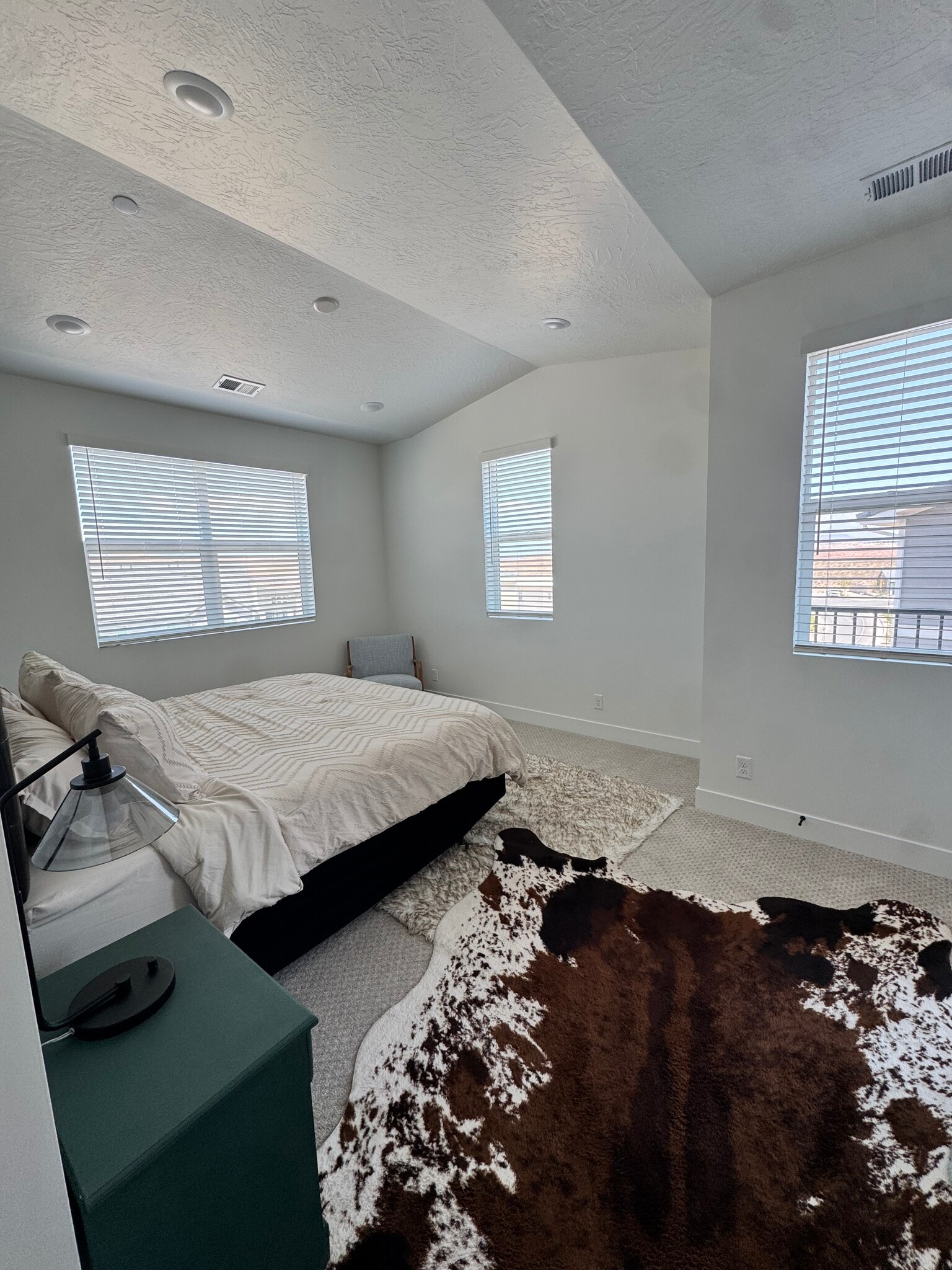 Bedroom 1: Primary with en suite bathroom and walk in closet. Additional patio. - 6051 S Silver Birch Ln