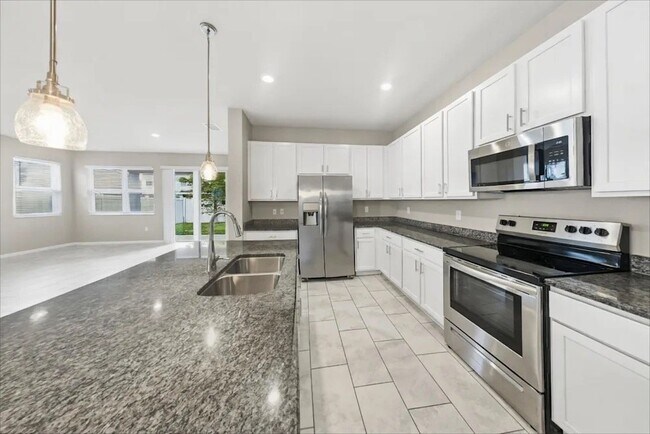 Building Photo - 14237 Seranoa Dr