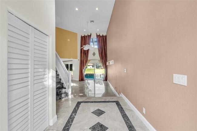 Building Photo - 5911 NW 59th Ave