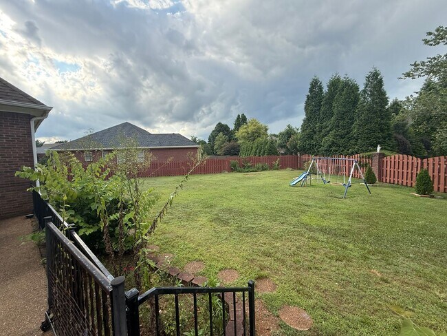 Building Photo - Spacious 5-Bedroom Home on a Corner Lot in...