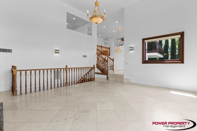Building Photo - Spacious 5-Bedroom Home with Modern Amenit...