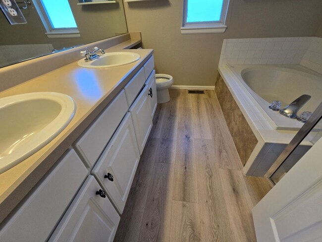 Building Photo - Beautiful and Fresh Updated Four Bedroom Home on a Corner Lot in Rock Creek!