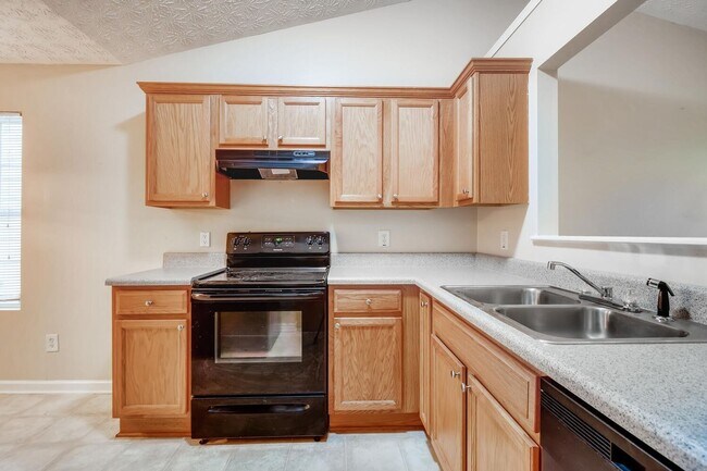 Building Photo - Newer Ranch Style Home w/Fireplace, Trey Ceilings and Black Appliances - Total Electric