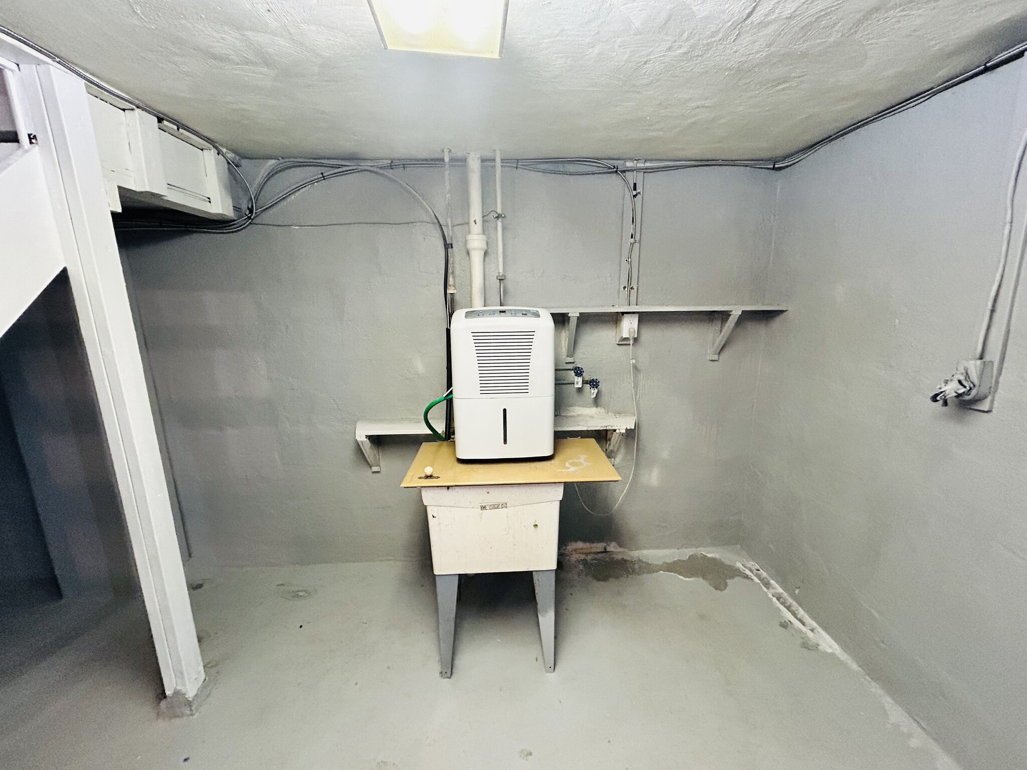 Basement with washer dryer hookups and dehumidifier - 715 Koogler St