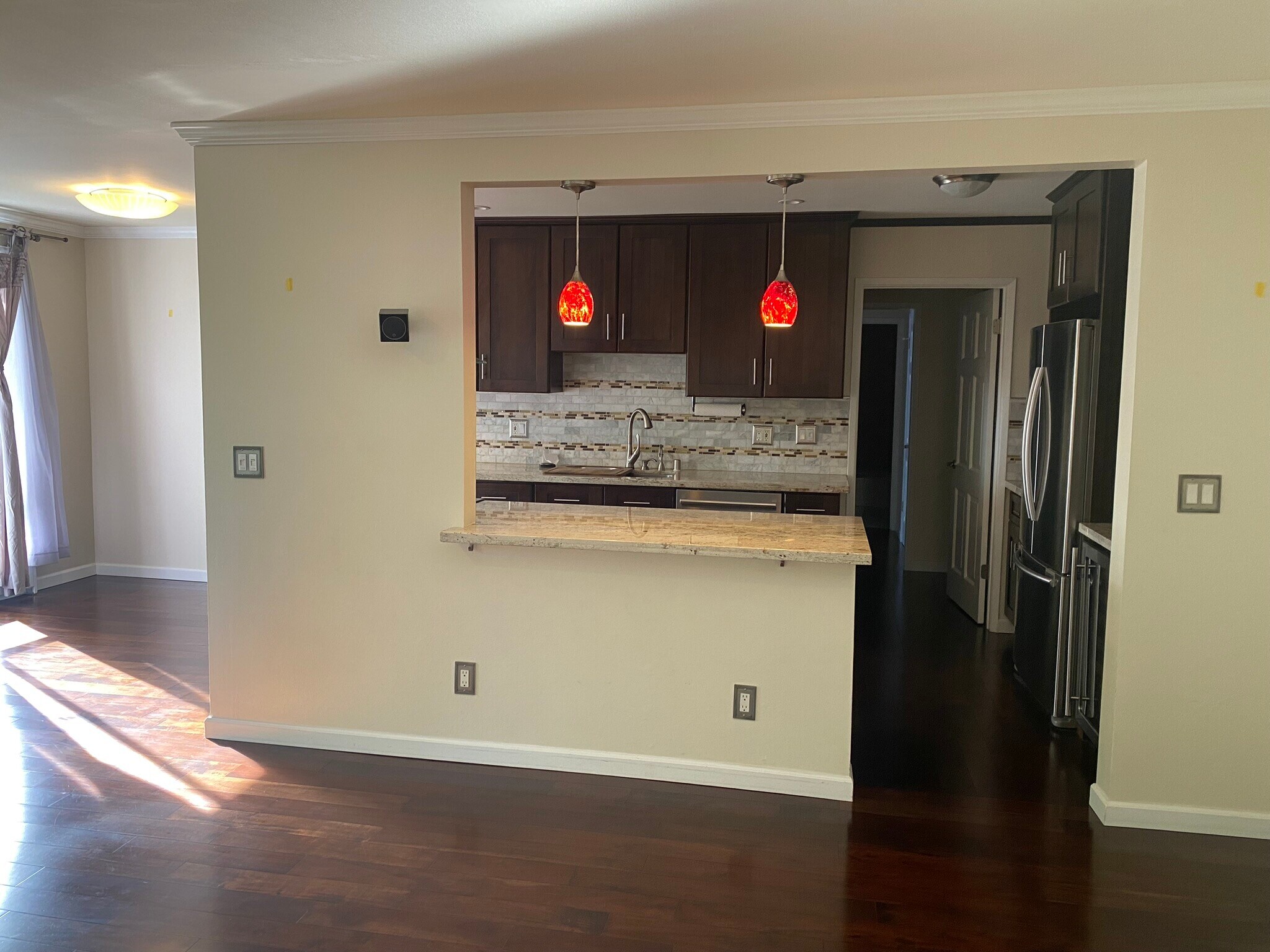 Kitchen with Marble Backsplash and under-the-counter Hooks for Purses - 4 Admiral Dr