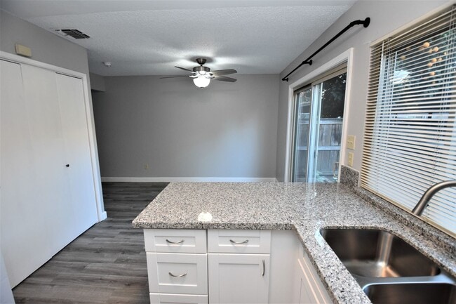 Building Photo - 8744 Woodman Way