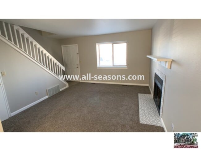 Building Photo - Located near Omaha and Powers, this fully ...