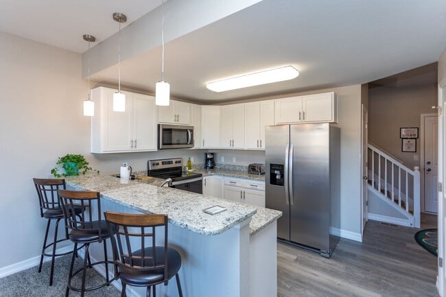 Building Photo - Stylish 3-Bedroom Townhome with Fireplace, Modern Kitchen & Spacious Layout!