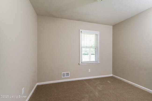 Building Photo - 8003 Canna Dr