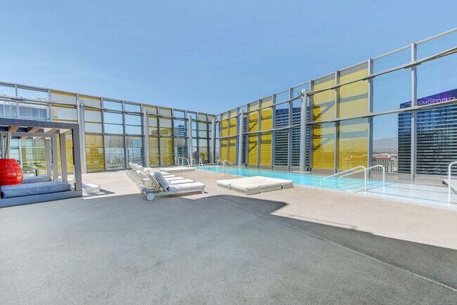 Building Photo - Stunning Strip Views from this Fully Furnished Studio Residence.