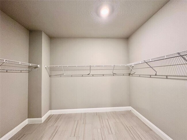 Building Photo - 9035 Dahlia Cir