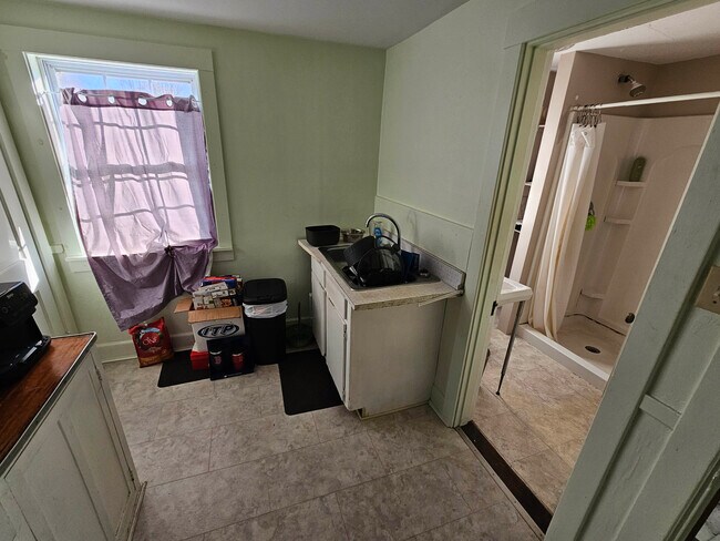 Kitchen full of junk - 1 Page St