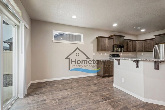 Building Photo - 3 Bedroom 2 Bath Home with 2-Car Attached ...