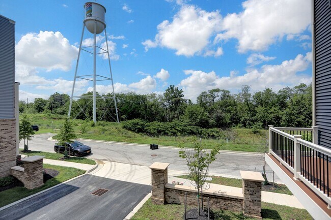 Building Photo - Luxury 4-Story Townhome with Rooftop Terrace!