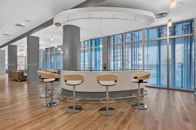 Building Photo - 10275 Collins Ave