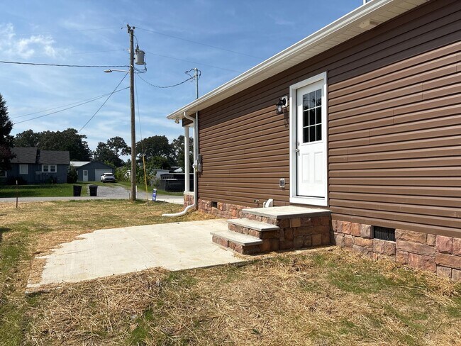 Building Photo - Charming New Home with a Rocking Chair Front Porch!