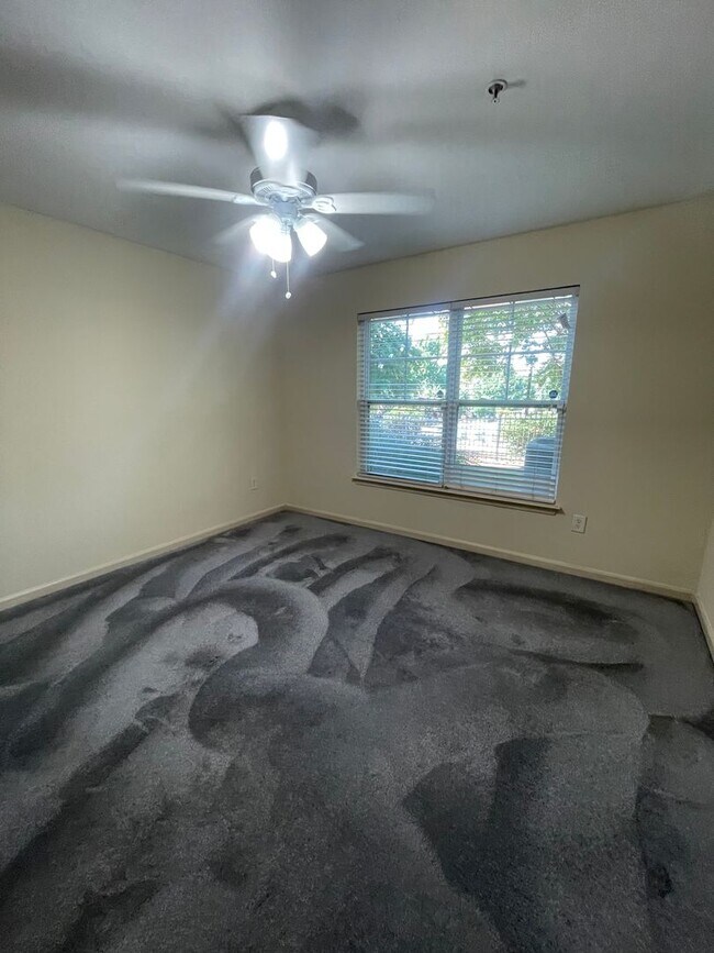 Building Photo - Two Bedrooms Available in this Three Bedroom Flat, Female Applicants!