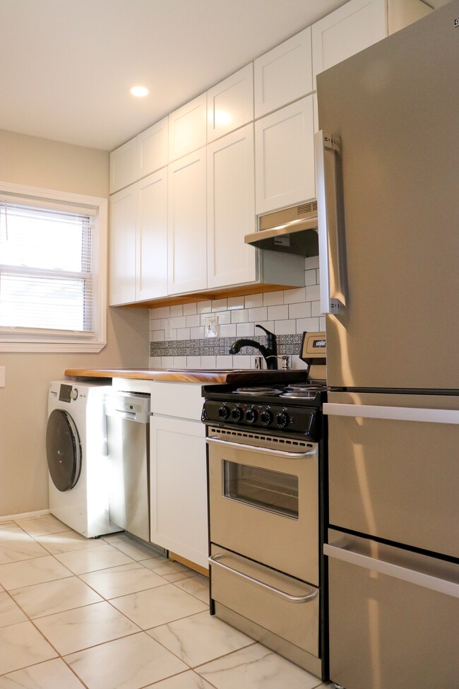 dishwasher, all in one washer dryer unit. - 1305 Norris Ave