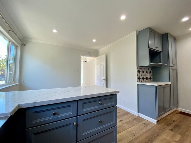 Building Photo - Remodeled 3BR, 2BA with Orchard, Garage & ...