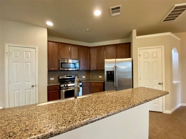 Building Photo - 1310 W Parmer Ln